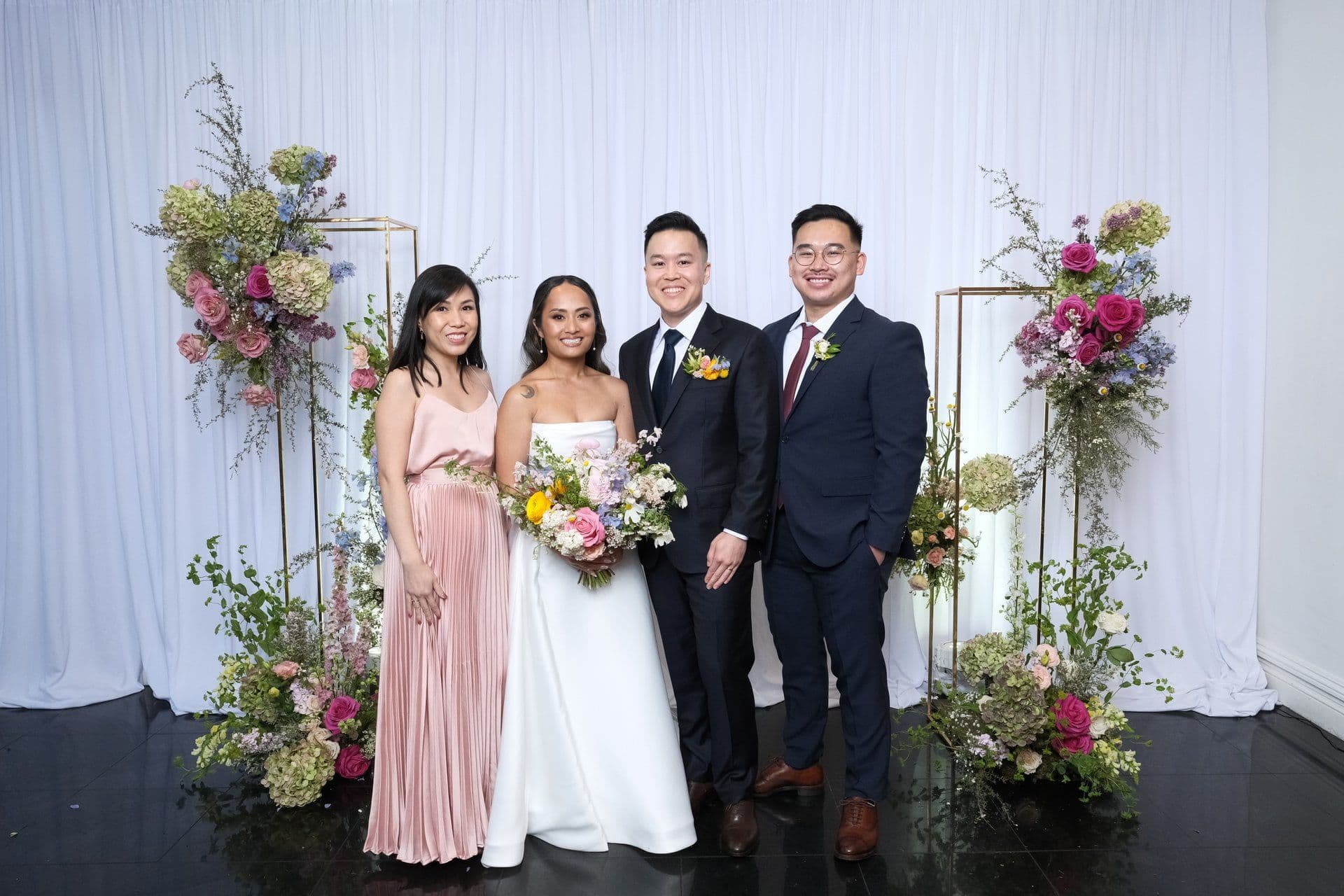 A wedding couple with the Radiate team